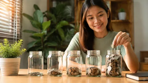 ภาพประกอบเสมือนจริงของโหลใส่เหรียญเรียงลำดับการออมอย่างสม่ำเสมอ
