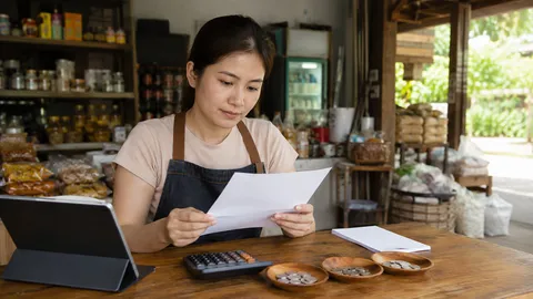 ภาพประกอบเสมือนจริงของเจ้าของร้านตรวจใบแจ้งหนี้และเหรียญที่แยกในถ้วย